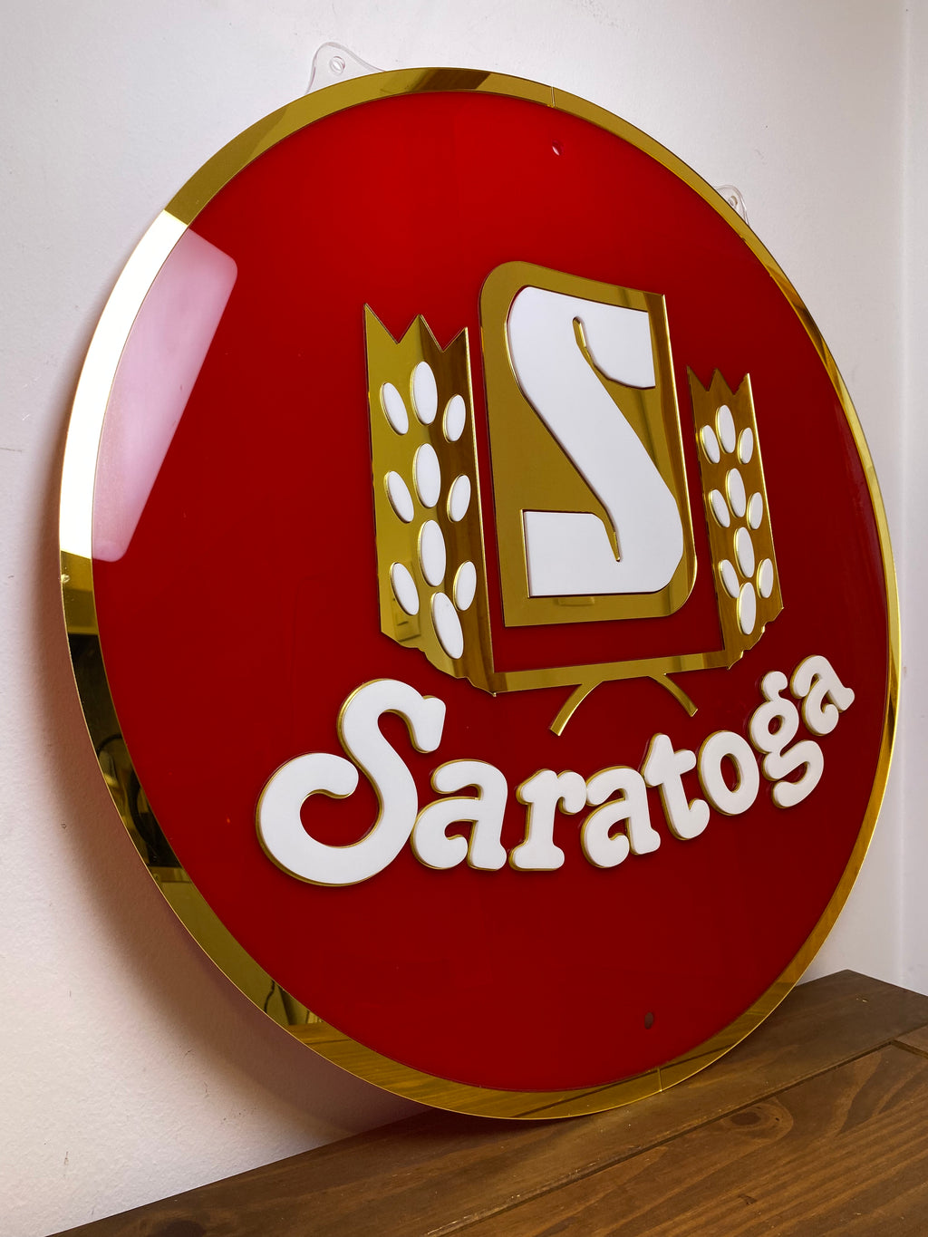 Cartel acrílico circular multicapa con logo sin luz